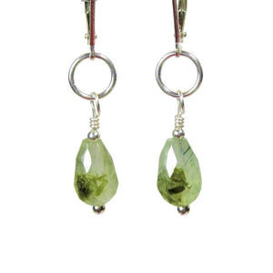 Beautifully faceted light green Prehnite natural gemstone earrings dangle from Sterling silver hooks.