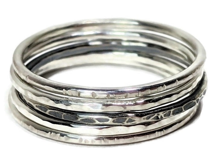 A set of 5 Sterling silver stacking rings with a variety of textures by Danare Designs