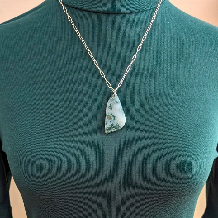Natural moss agate pendant on a sterling silver necklace.