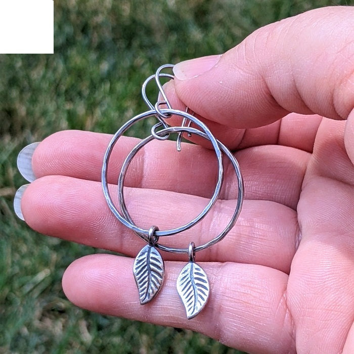 Sterling silver hoop earrings with leaves
