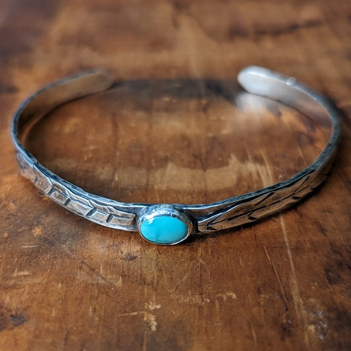 The Whitney Bracelet - Sterling silver and Turquoise bracelet with hand-crafted silver feathers.