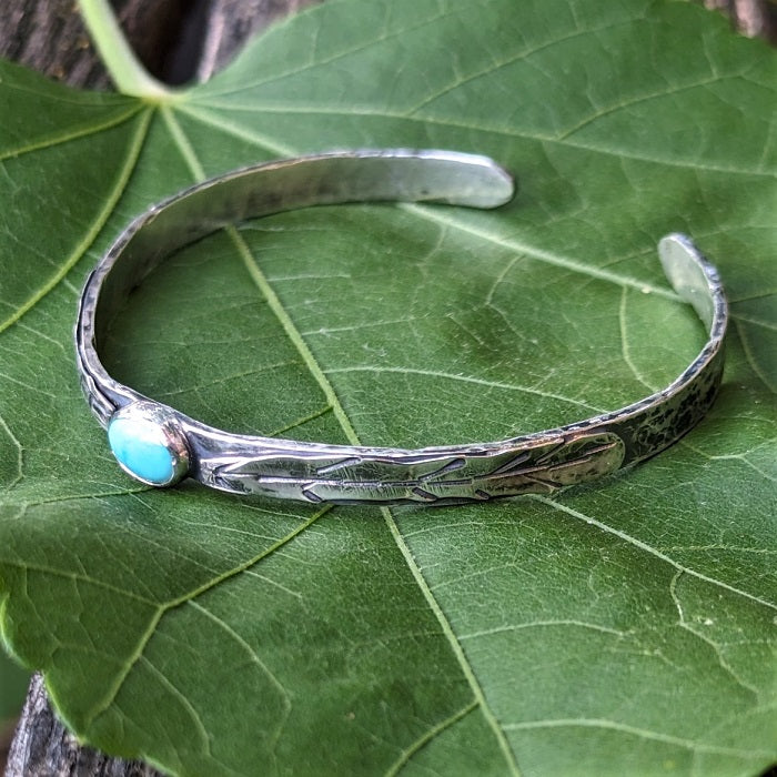 The Whitney Bracelet - Sterling silver and Turquoise bracelet with hand-crafted silver feathers.