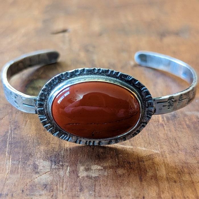 Sterling silver bracelet - "Arizona Sunset" - Red Jasper Bracelet sitting on weathered wood