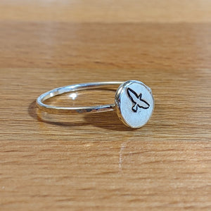 Hand-forged Sterling Silver Inspiration ring showing a bird taking flight