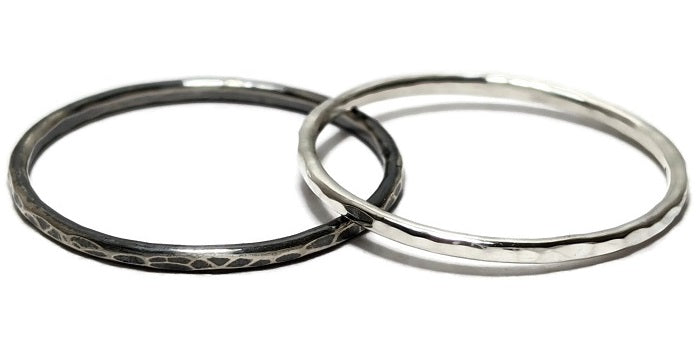 Sterling silver oxidized hammered and bright silver stacking rings by Danare Designs