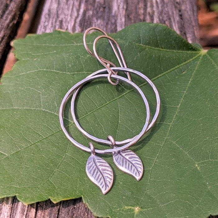 Sterling silver hoop earrings with leaves